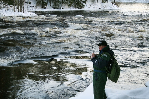 The fishing season stretches throughout the winter on the Kapeenkoski Rapids, Laukaa.